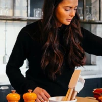 lady in the kitchen staying cool with Chiller Portable AC